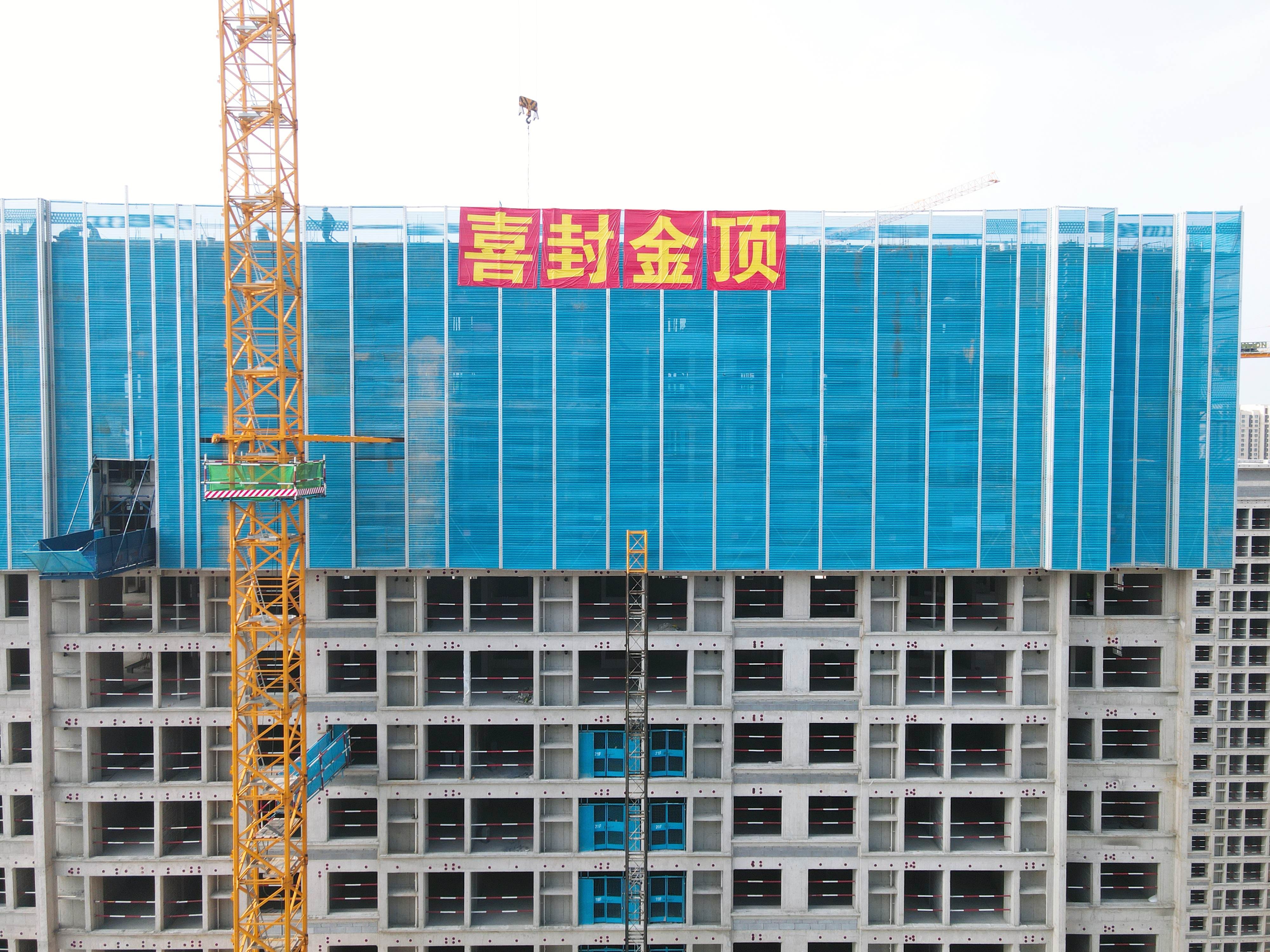 1754033166879238.jpg 京口路保障性住房項目主體結(jié)構(gòu)全面封頂(2).jpg